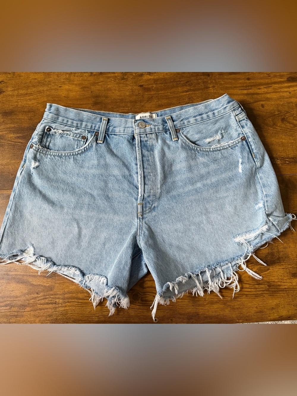 Agolde Light Blue Distressed Denim Cutoff Shorts